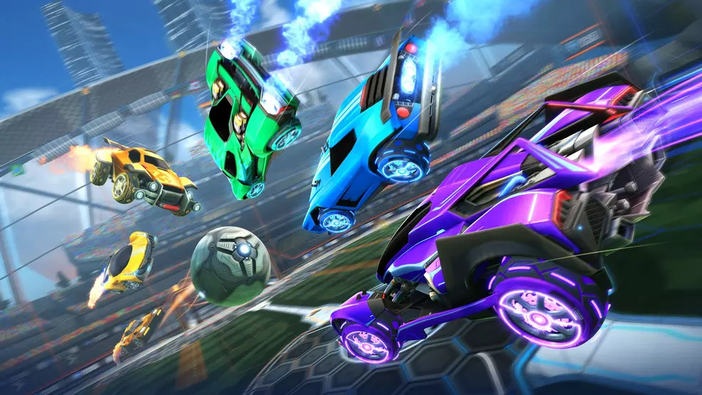 Several cars in the air racing towards the ball in Rocket League