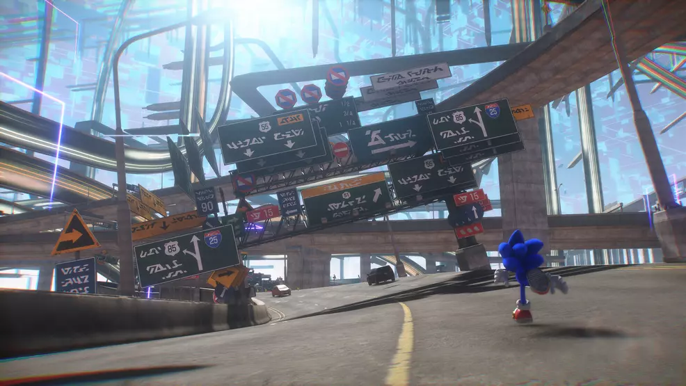 Sonic racing toward a set of street signs in a freeway setting from one of the game's Cyber Space levels