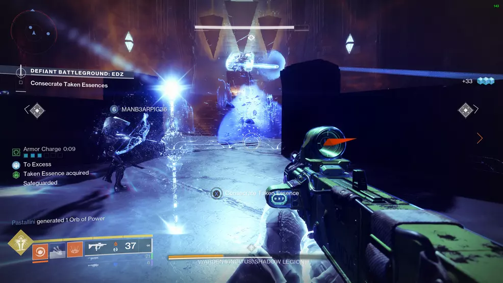The player stands in a Safeguard zone about to collect a Taken Essence
