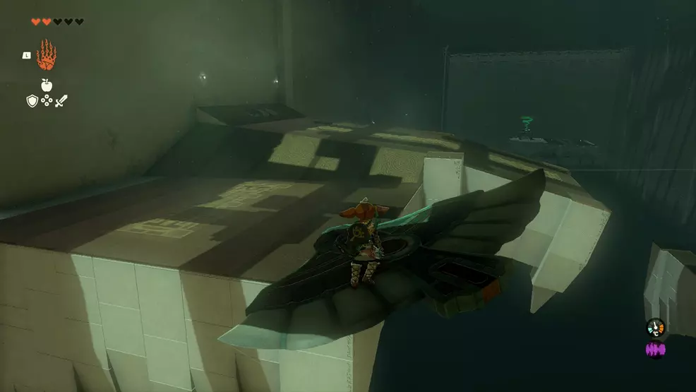 Link glides over to a platform using Zonai wings