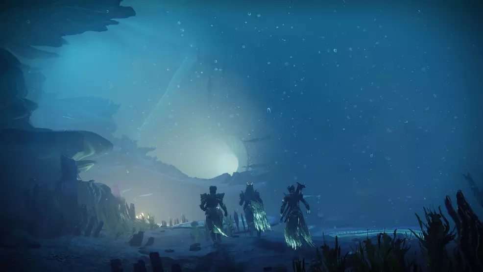 An image showing three Guardians exploring the Ghosts of the Deep dungeon in Destiny 2