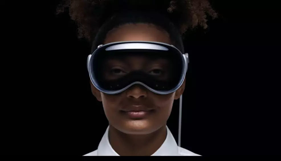 A woman wearing the Vision Pro headset.