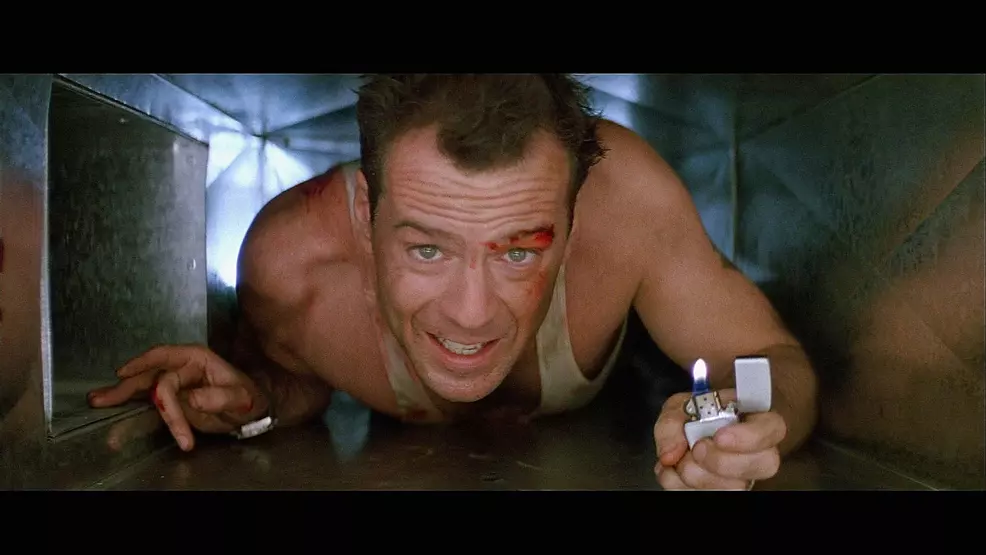 Bruce Willis crawling through a vent in Die HArd.