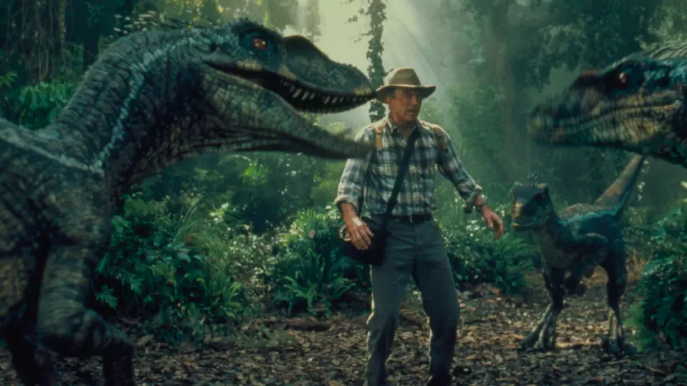 Dr. Alan grant surrounded by three raptors.