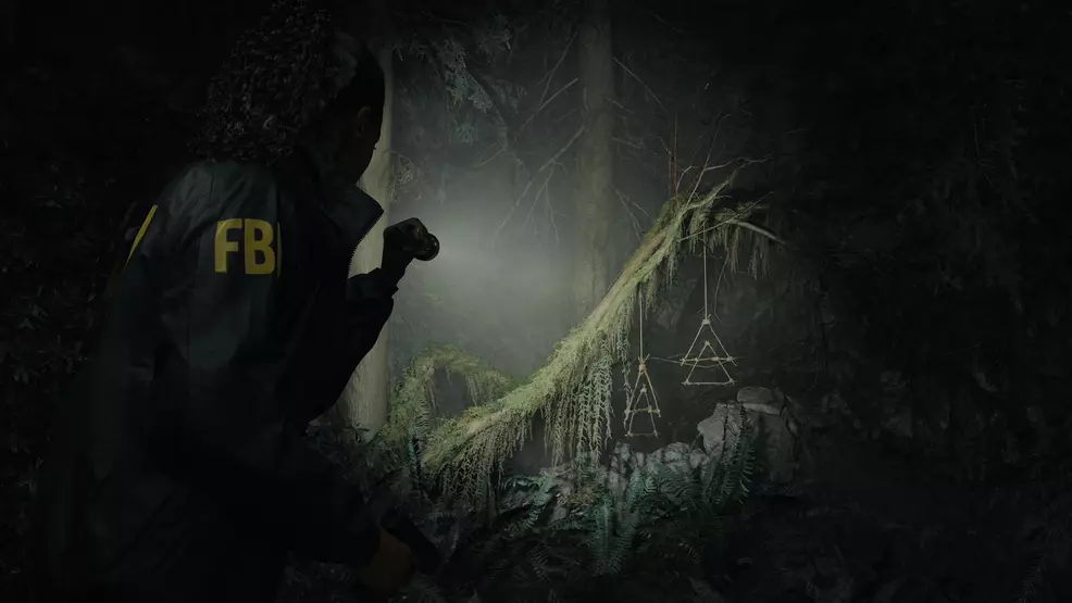 Saga from Alan Wake 2 creeps through a forest