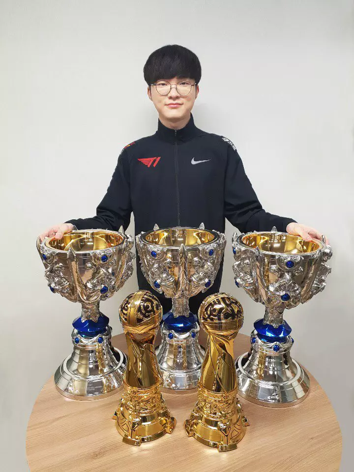 Faker with his trophies