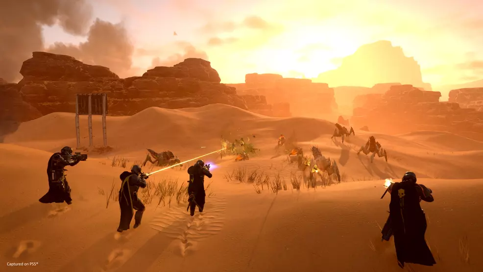 Players traveling through a sand biome.