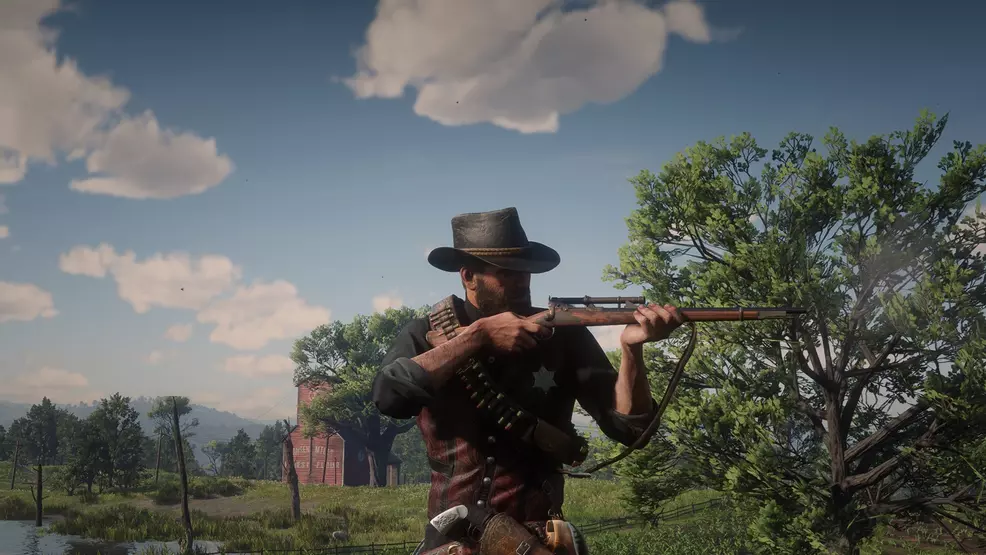 Arthur Morgan lining up a shot in his trademark hat in Red Dead Redemption 2.