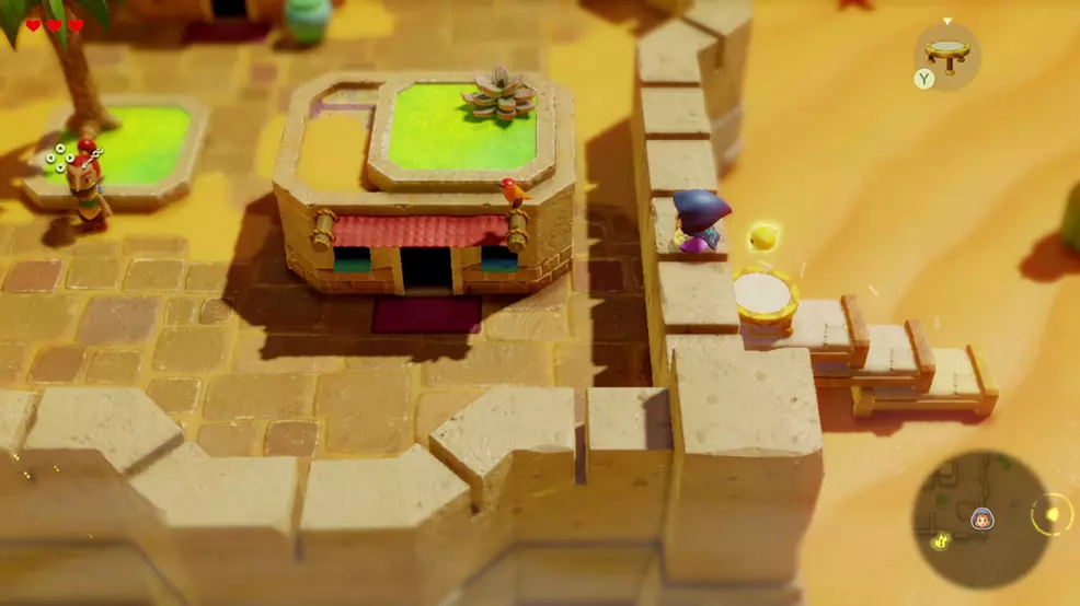 Zelda uses beds to scale a castle wall in the desert.