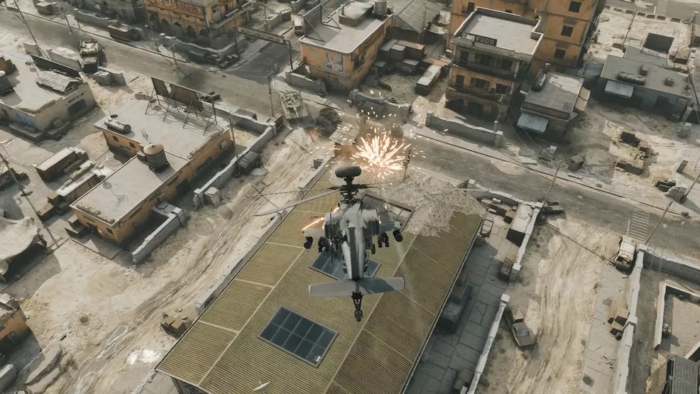 A helicopter flies over a warehouse in Havoc Warfare