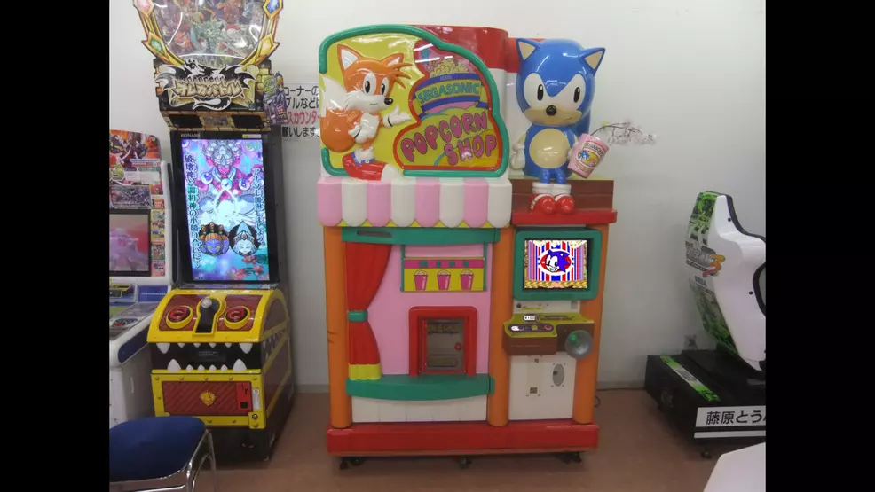 A Segasonic Popcorn Shop machine in an arcade, in good condition