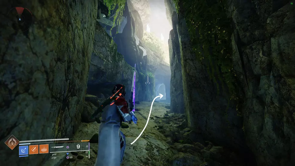 Standing in a cavern hallway near a arm-covered door