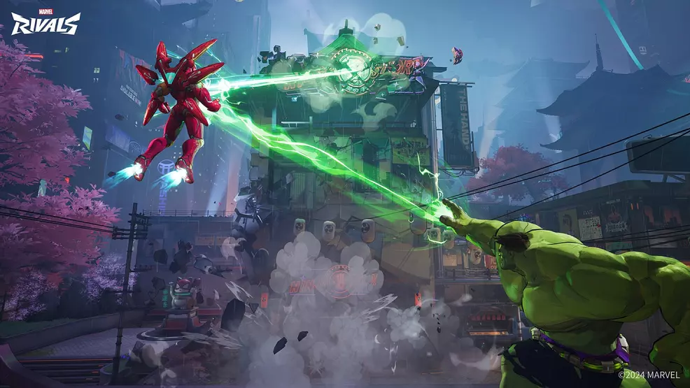 Iron Man destroys a building with his Unibeam in Marvel Rivals.