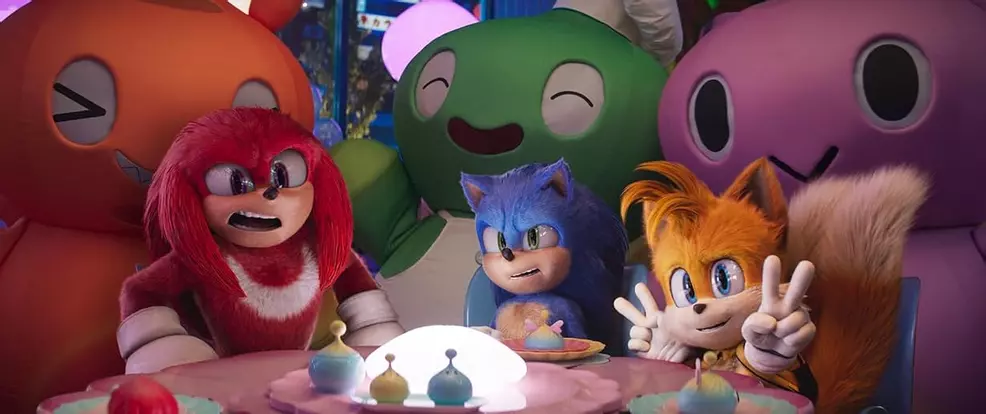 Sonic, Tails and Knuckles in front of the mascot character Chao in Sonic the Hedgehog 3.