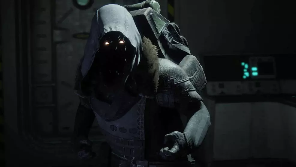 Xur in a dimly lit room.