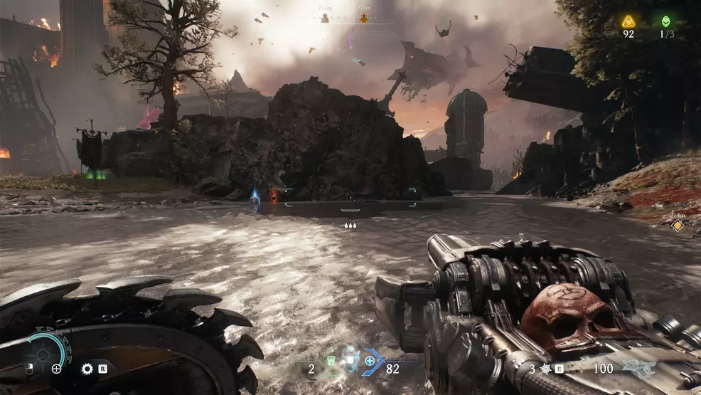 The player stands in shallow water facing a rock