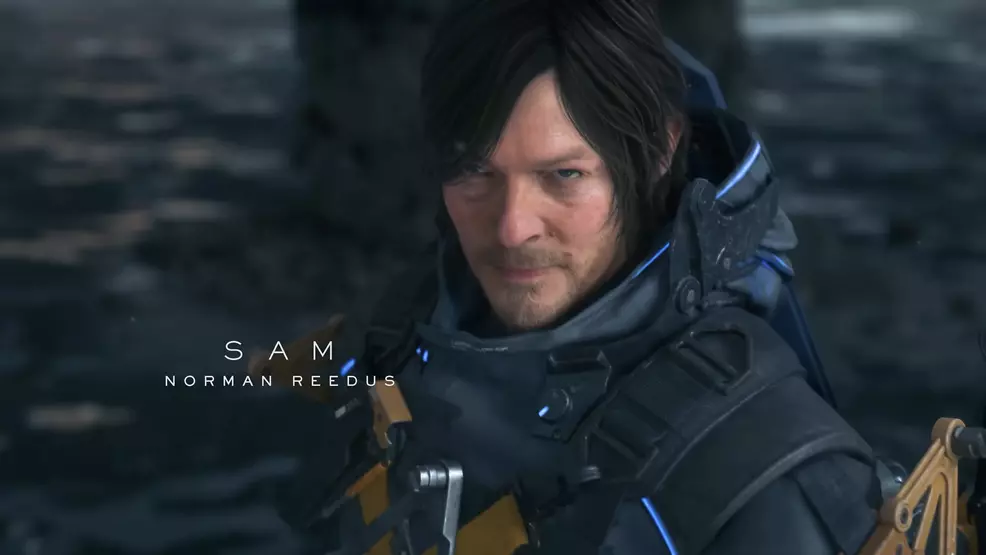 Sam Porter is looking towards the bridge, camera.