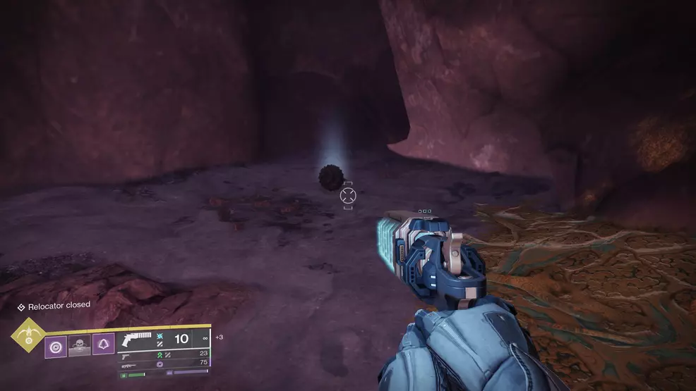 A Temporal Alignment catalyst fragment in a dark cave for the Graviton Spike Exotic Hand Cannon in Destiny 2: The Edge of Fate
