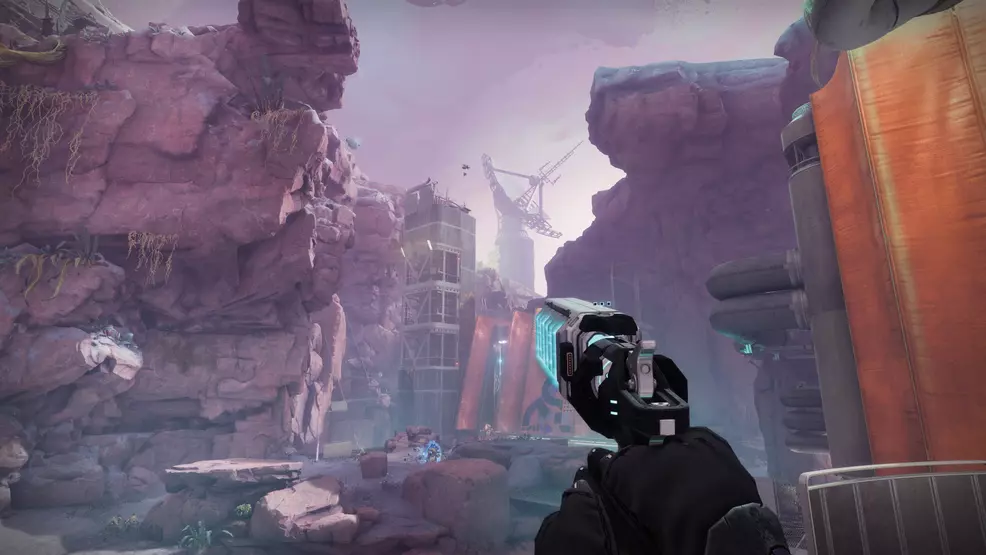 Holding the Graviton Spike Exotic Hand Cannon in Destiny 2