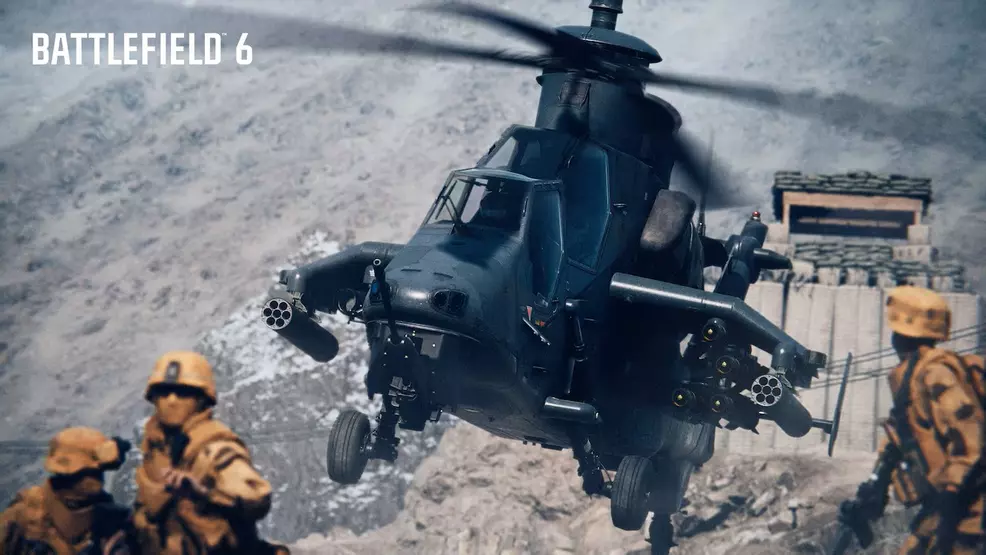 Soldiers run from a helicopter