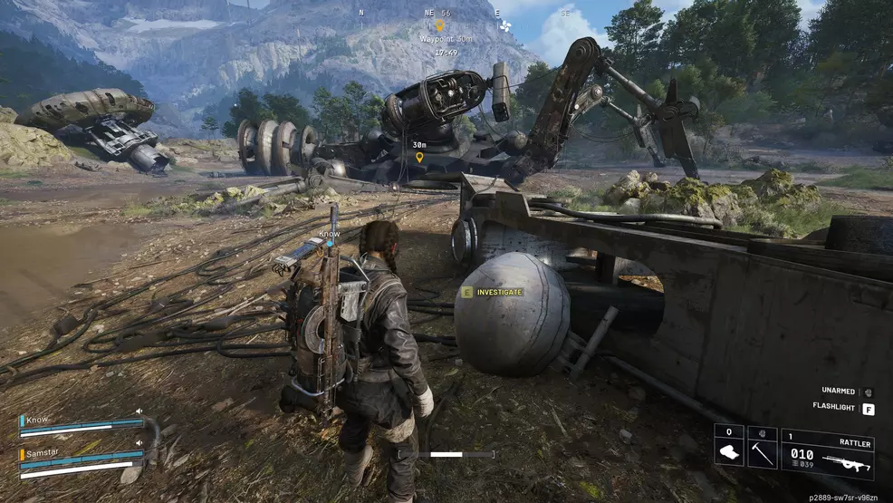 Two players beside an interact point near a robot leg