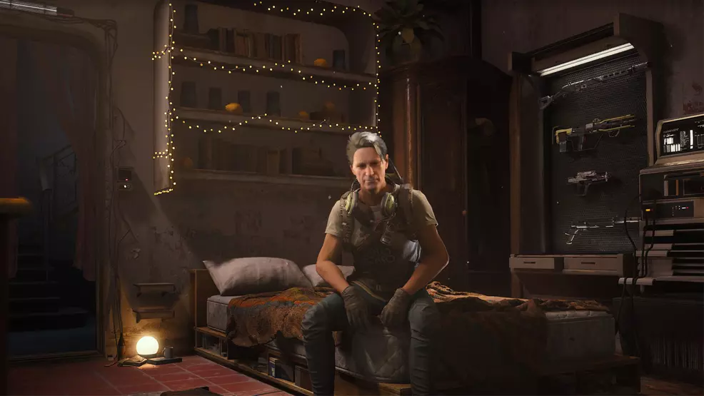 Un asaltante sentado en su apartamento en Speranza en ARC Raiders.