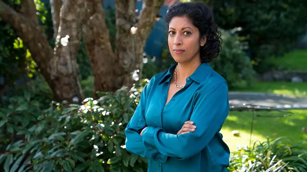 Priyanga Burford with her arms folded.