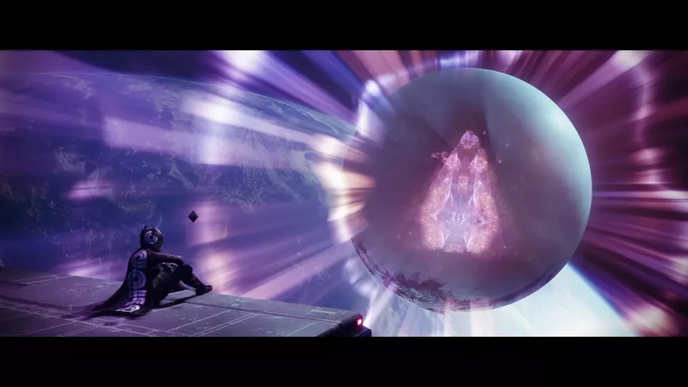 The player sitting looking at the Traveler